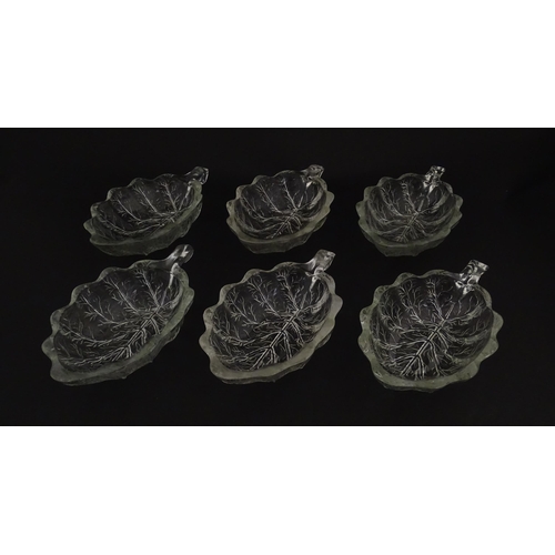 201 - A set of six glass avocado dishes of stylised leaf form. Approx. 7