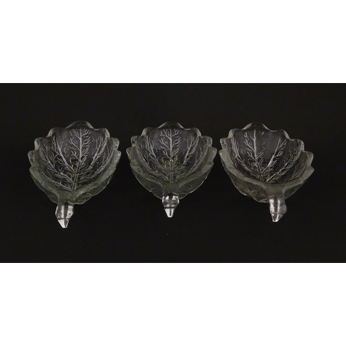 201 - A set of six glass avocado dishes of stylised leaf form. Approx. 7