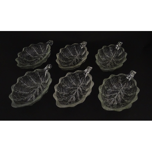 201 - A set of six glass avocado dishes of stylised leaf form. Approx. 7