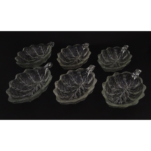 201 - A set of six glass avocado dishes of stylised leaf form. Approx. 7