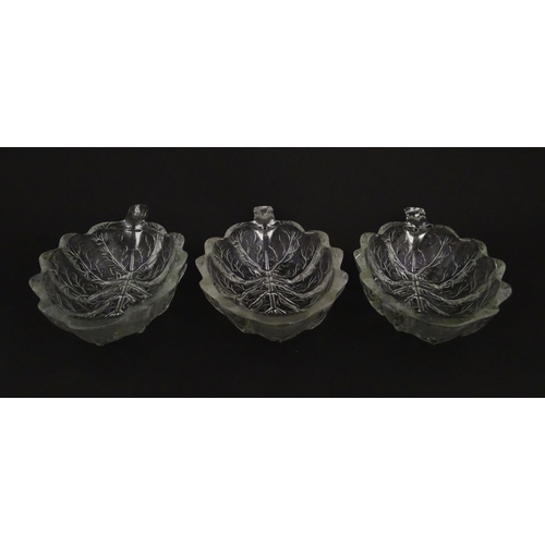 201 - A set of six glass avocado dishes of stylised leaf form. Approx. 7