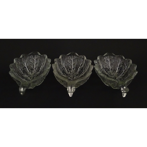 201 - A set of six glass avocado dishes of stylised leaf form. Approx. 7