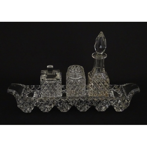 207 - Assorted glass items to include eleven knife rests, cruet, and candle stands of pricket form by Swar... 