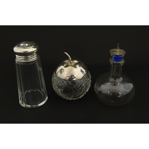 213A - A panel cut glass sugar caster with silver top hallmarked Birmingham 1912. Together with a cut glass... 