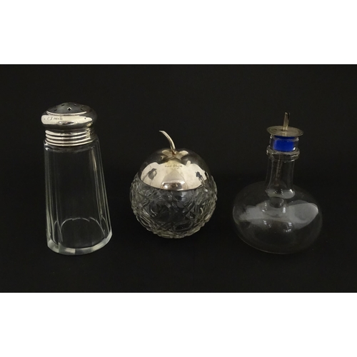 213A - A panel cut glass sugar caster with silver top hallmarked Birmingham 1912. Together with a cut glass... 