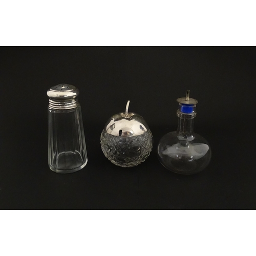 213A - A panel cut glass sugar caster with silver top hallmarked Birmingham 1912. Together with a cut glass... 