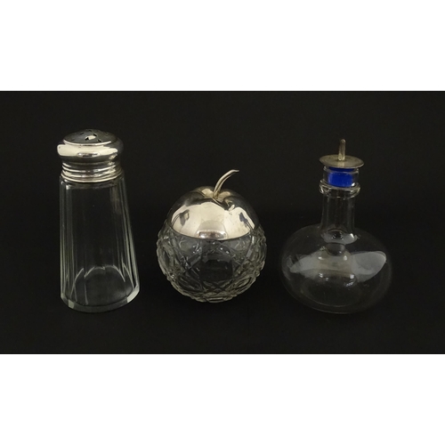 213A - A panel cut glass sugar caster with silver top hallmarked Birmingham 1912. Together with a cut glass... 