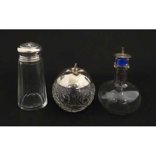 213A - A panel cut glass sugar caster with silver top hallmarked Birmingham 1912. Together with a cut glass... 