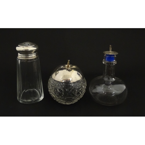 213A - A panel cut glass sugar caster with silver top hallmarked Birmingham 1912. Together with a cut glass... 