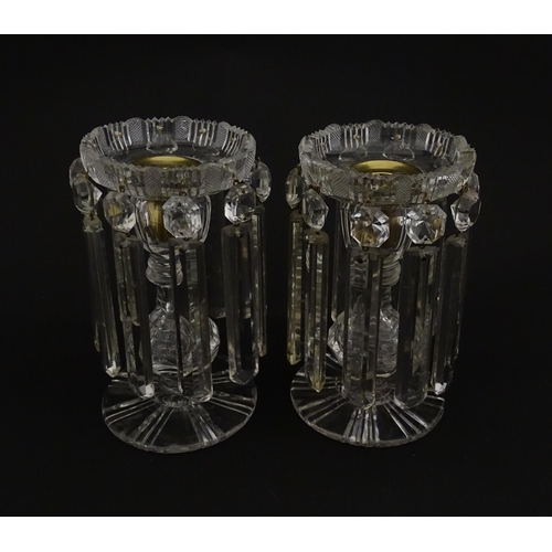 218 - A pair of 20thC cut glass table lustres / candle stands. Approx. 7