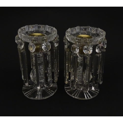 218 - A pair of 20thC cut glass table lustres / candle stands. Approx. 7