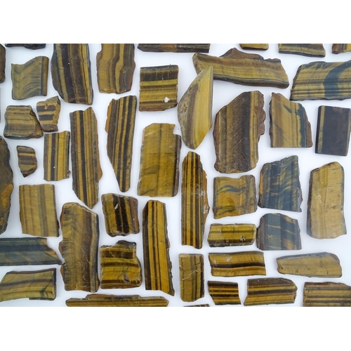 1093 - Natural History / Geology Interest: A quantity of hardstone tiger's eye specimen slices. Largest app... 