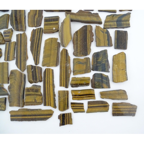 1093 - Natural History / Geology Interest: A quantity of hardstone tiger's eye specimen slices. Largest app... 