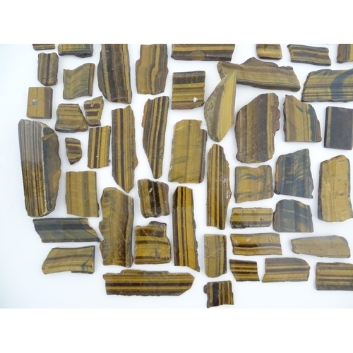 1093 - Natural History / Geology Interest: A quantity of hardstone tiger's eye specimen slices. Largest app... 