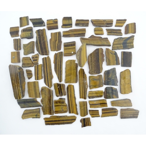 1093 - Natural History / Geology Interest: A quantity of hardstone tiger's eye specimen slices. Largest app... 