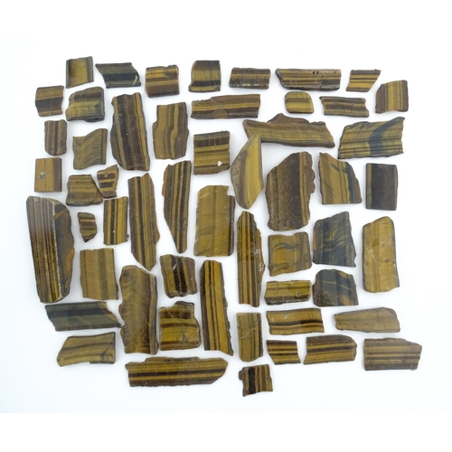 1093 - Natural History / Geology Interest: A quantity of hardstone tiger's eye specimen slices. Largest app... 