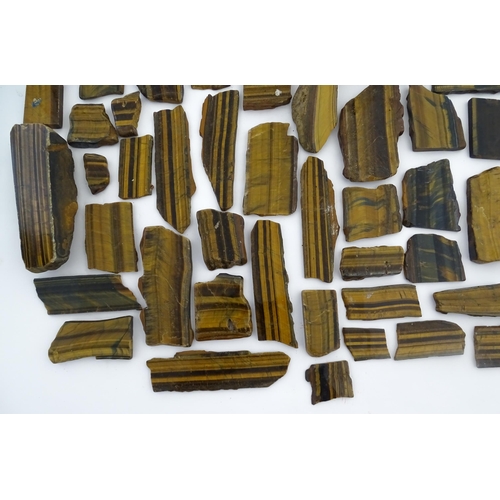 1093 - Natural History / Geology Interest: A quantity of hardstone tiger's eye specimen slices. Largest app... 