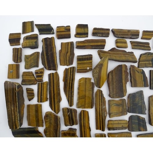 1093 - Natural History / Geology Interest: A quantity of hardstone tiger's eye specimen slices. Largest app... 