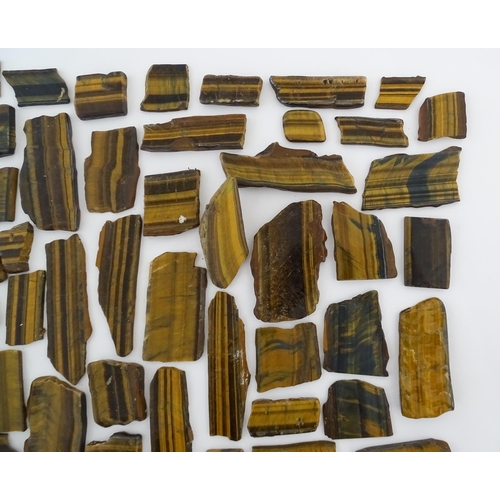 1093 - Natural History / Geology Interest: A quantity of hardstone tiger's eye specimen slices. Largest app... 