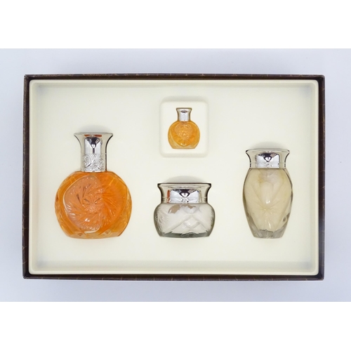 1094 - A quantity of assorted perfumes to include a boxed gift set of Safari by Ralph Lauren, Arpege by Lan... 