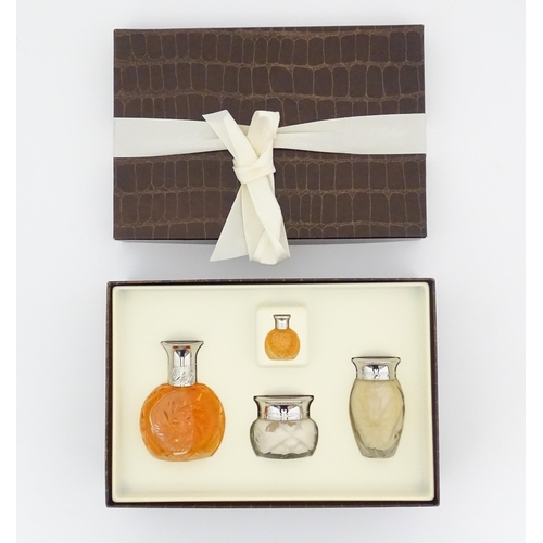 1094 - A quantity of assorted perfumes to include a boxed gift set of Safari by Ralph Lauren, Arpege by Lan... 