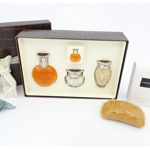 1094 - A quantity of assorted perfumes to include a boxed gift set of Safari by Ralph Lauren, Arpege by Lan... 