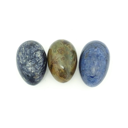 1102 - Natural History / Geology Interest: Three polished hardstone specimen eggs to include a lapis lazuli... 