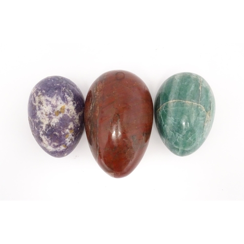 1103 - Natural History / Geology Interest: Three polished hardstone specimen eggs to include red jasper, et... 