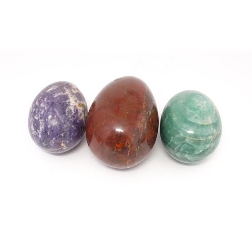 1103 - Natural History / Geology Interest: Three polished hardstone specimen eggs to include red jasper, et... 