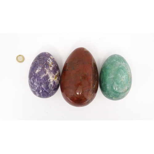 1103 - Natural History / Geology Interest: Three polished hardstone specimen eggs to include red jasper, et... 