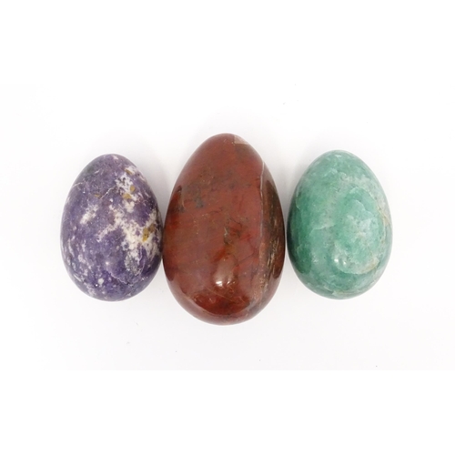 1103 - Natural History / Geology Interest: Three polished hardstone specimen eggs to include red jasper, et... 