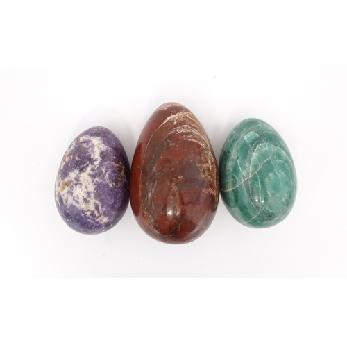 1103 - Natural History / Geology Interest: Three polished hardstone specimen eggs to include red jasper, et... 