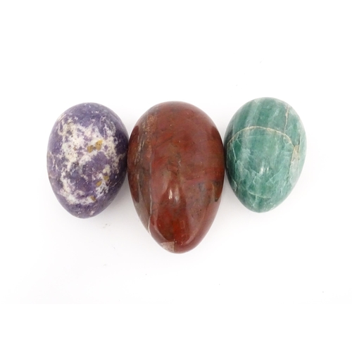 1103 - Natural History / Geology Interest: Three polished hardstone specimen eggs to include red jasper, et... 