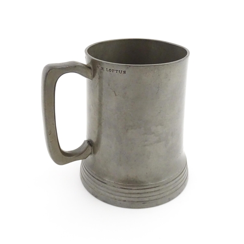 1156 - A Victorian pewter half pint tankard mug stamped W. R. Loftus, with a glass base, the body engraved ... 