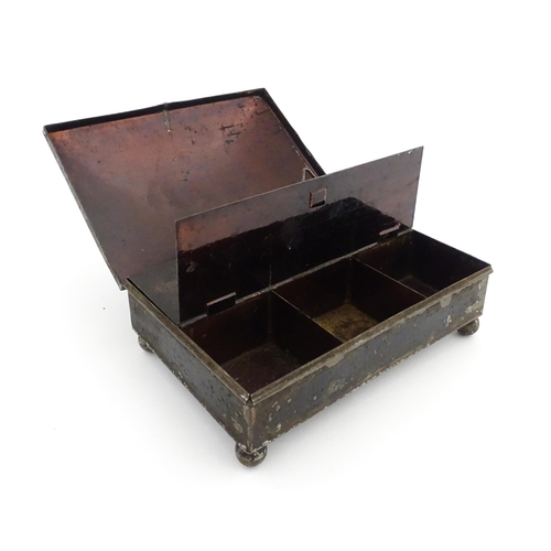 1157 - A Victorian tole peinte spice box opening to reveal twin hinged lids each concealing three sections,... 