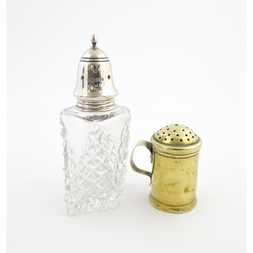 1170 - A cut glass sugar sifter with silver top hallmarked London 1961, maker Preece & Willicombe. Together... 