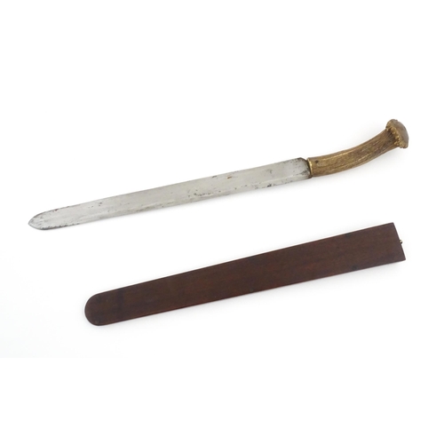 1171 - Kitchenalia : an early 20thC butcher's slicing knife, with antler handle, steel blade and wooden she... 