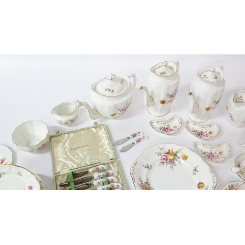 173 - A quantity of Royal Crown Derby tea wares in the Derby Posies pattern to include teapot, hot water p... 