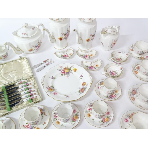 173 - A quantity of Royal Crown Derby tea wares in the Derby Posies pattern to include teapot, hot water p... 