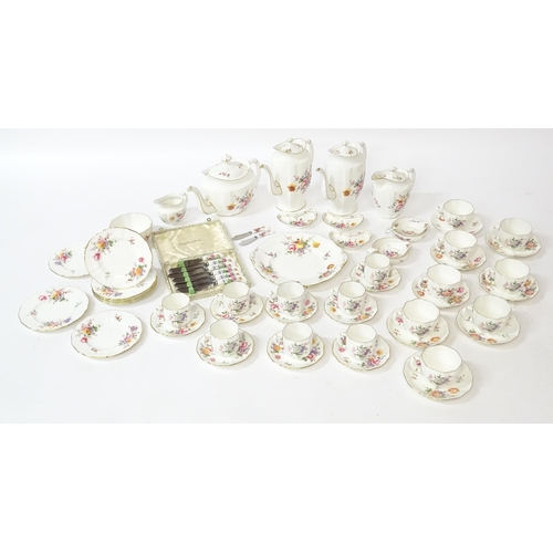 173 - A quantity of Royal Crown Derby tea wares in the Derby Posies pattern to include teapot, hot water p... 