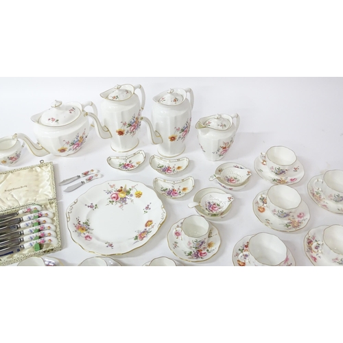 173 - A quantity of Royal Crown Derby tea wares in the Derby Posies pattern to include teapot, hot water p... 