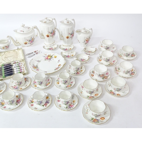 173 - A quantity of Royal Crown Derby tea wares in the Derby Posies pattern to include teapot, hot water p... 