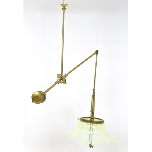 1399 - An Art Nouveau brass adjustable counter balance ceiling light with large flared vaseline glass shade... 