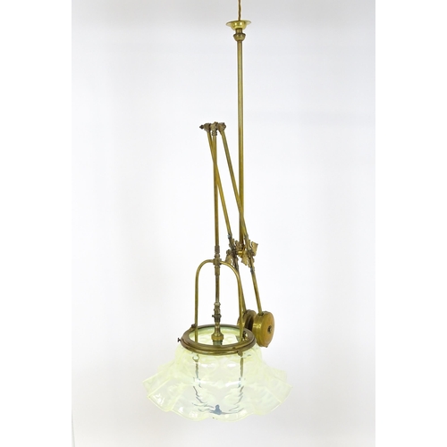 1399 - An Art Nouveau brass adjustable counter balance ceiling light with large flared vaseline glass shade... 