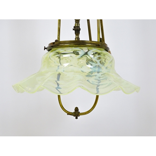 1399 - An Art Nouveau brass adjustable counter balance ceiling light with large flared vaseline glass shade... 