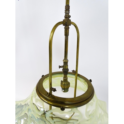 1399 - An Art Nouveau brass adjustable counter balance ceiling light with large flared vaseline glass shade... 