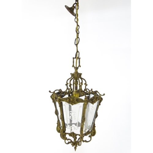 1401 - A 20thC pendant light of hexagonal lantern form. Approx. 18