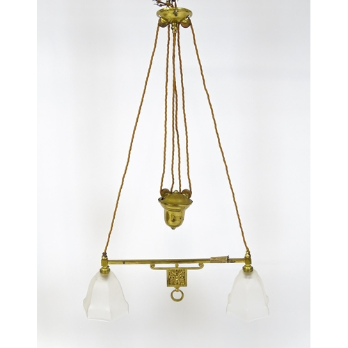 1402 - An early 20thC rise and fall adjustable height pendant light with with brass detail and twin frosted... 