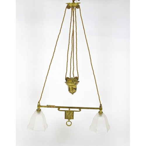 1402 - An early 20thC rise and fall adjustable height pendant light with with brass detail and twin frosted... 