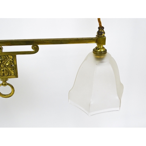 1402 - An early 20thC rise and fall adjustable height pendant light with with brass detail and twin frosted... 